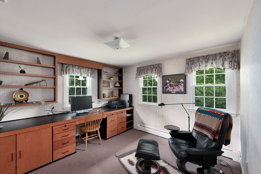 6 Trask Road Boxford, MA 01921 - Photo 18 of 36 a view of a workspace with furniture and a window