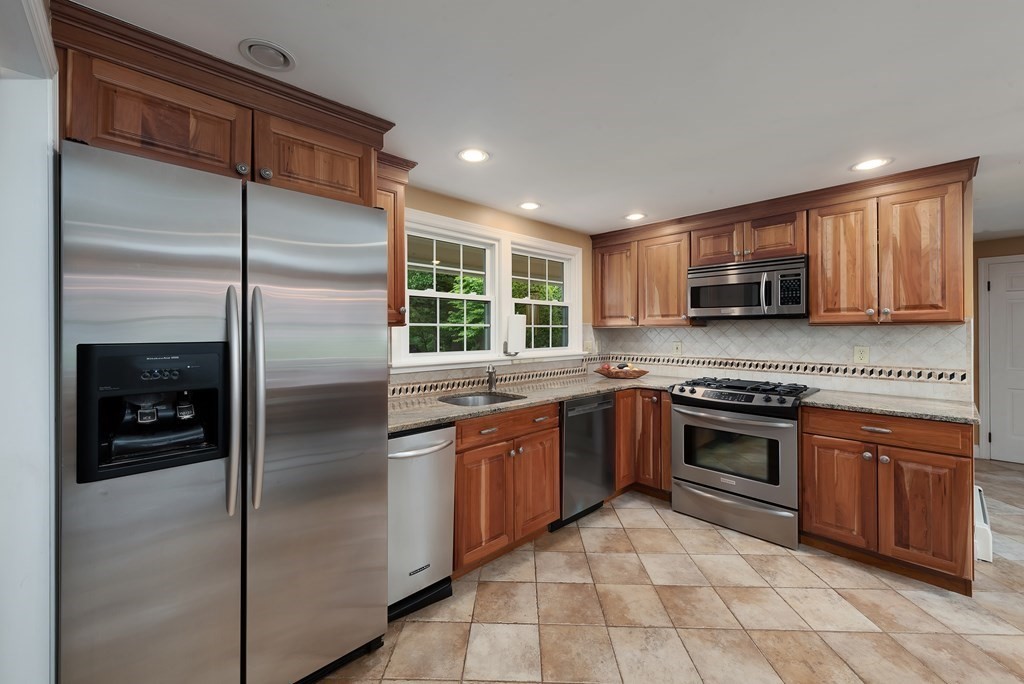 6 Trask Road Boxford, MA 01921 - Photo 5 of 36 a kitchen with stainless steel appliances granite countertop a refrigerator and a sink