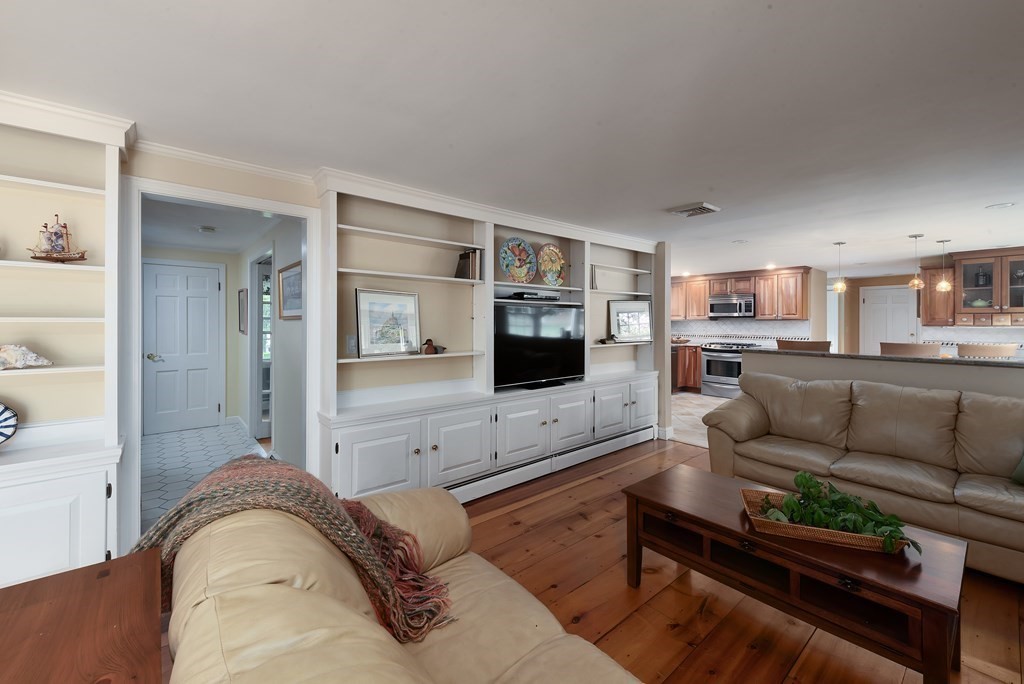 6 Trask Road Boxford, MA 01921 - Photo 7 of 36 a living room with furniture and a flat screen tv