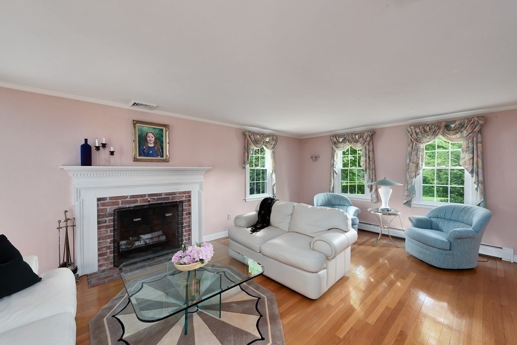 6 Trask Road Boxford, MA 01921 - Photo 8 of 36 a living room with furniture and a fireplace