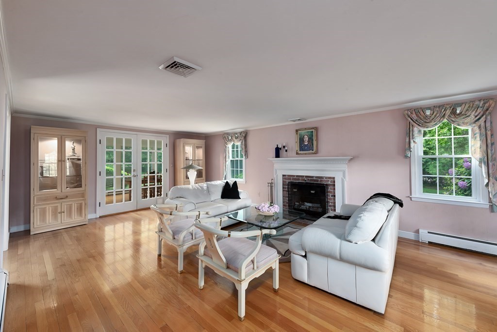 6 Trask Road Boxford, MA 01921 - Photo 9 of 36 a living room with furniture and a fireplace