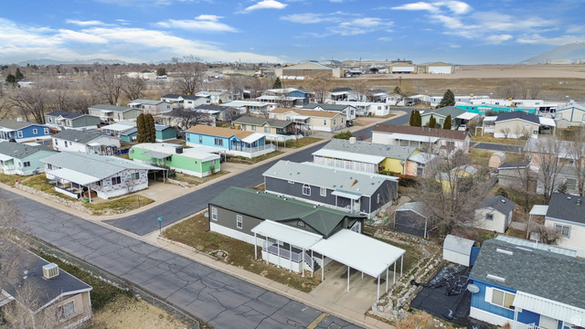 332 Hillgate Way Layton, UT 84041 - Photo 22 of 26 Aerial perspective of suburban area with mountains