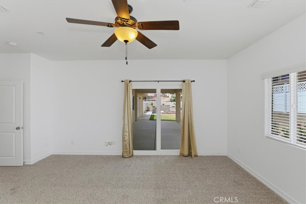 14202 Meadowlands Drive Riverside, CA 92503 - Photo 24 of 60 an empty room with closet and windows