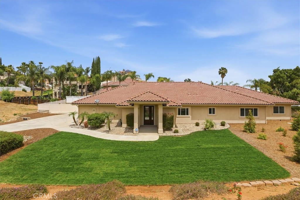 14202 Meadowlands Drive Riverside, CA 92503 - Photo 4 of 60 a view of a house with a yard porch and sitting area