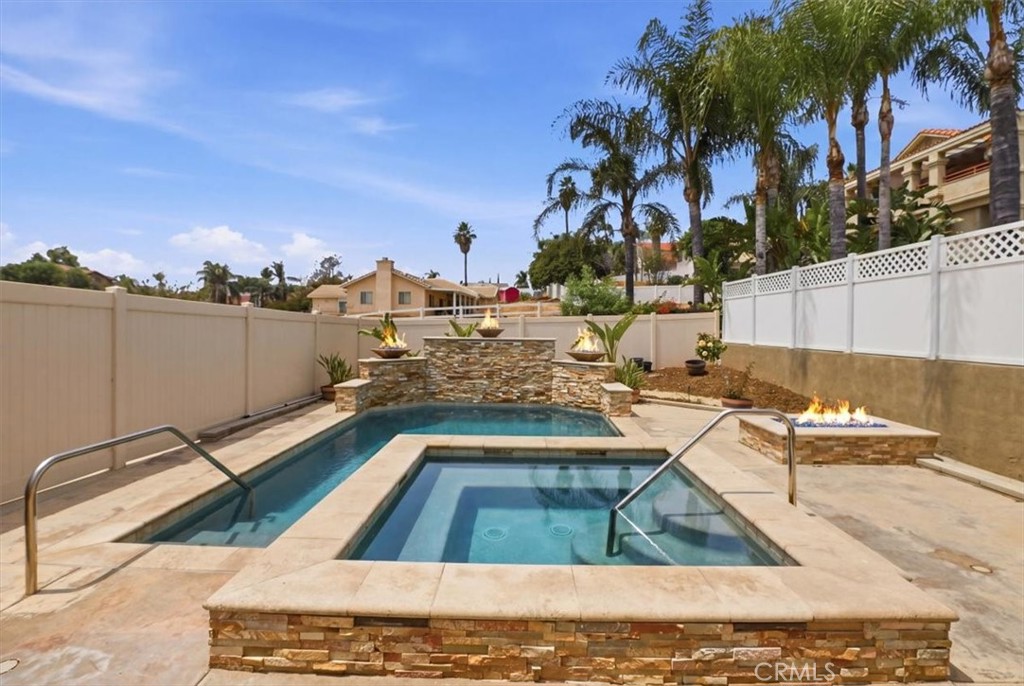 14202 Meadowlands Drive Riverside, CA 92503 - Photo 47 of 60 a view of swimming pool with outdoor seating and city view