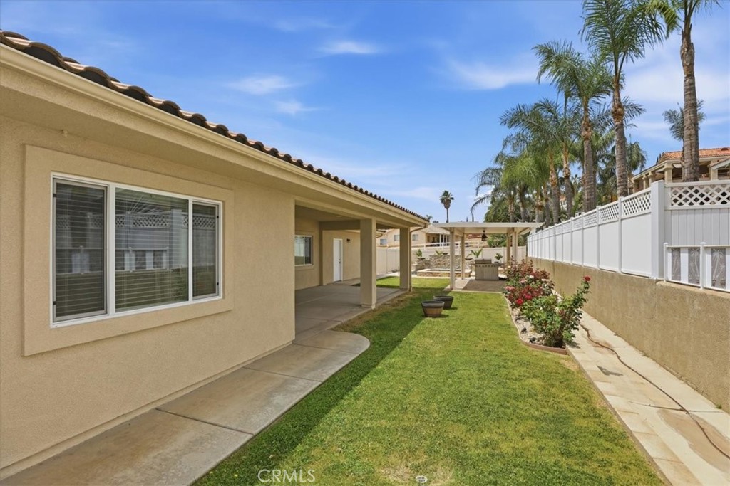 14202 Meadowlands Drive Riverside, CA 92503 - Photo 49 of 60 a view of a house with backyard and sitting area
