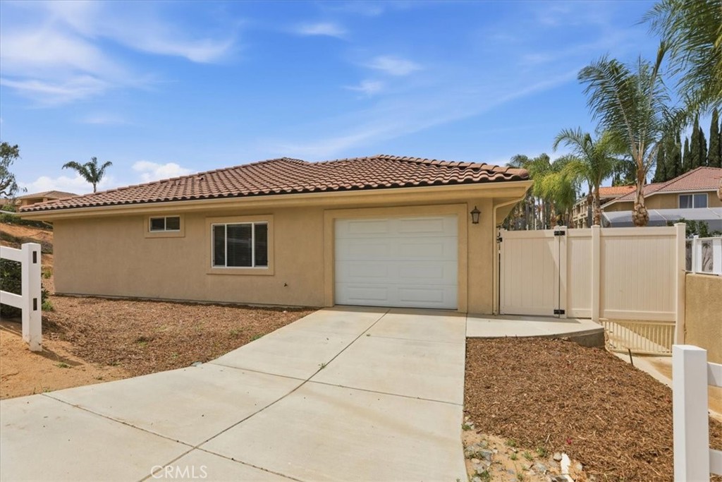 14202 Meadowlands Drive Riverside, CA 92503 - Photo 51 of 60 a view of a house with a patio