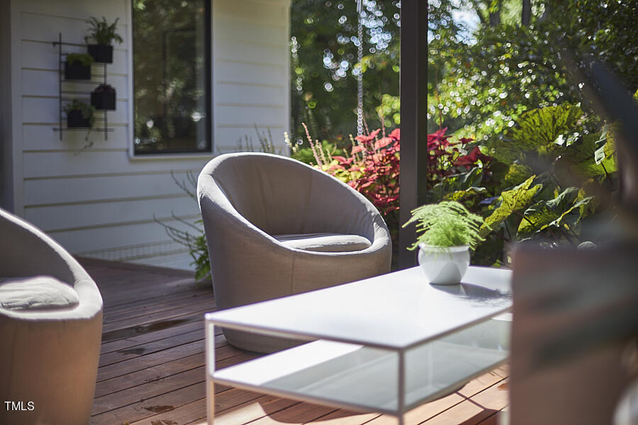 2620 Fairview Road Raleigh, NC 27608 - Photo 26 of 31 a view of a wooden bench in a backyard