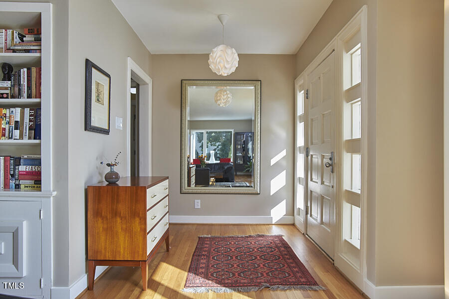 2620 Fairview Road Raleigh, NC 27608 - Photo 3 of 31 a view of an entryway with wooden floor