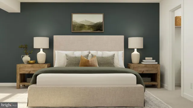 a bedroom with a bed and lamp