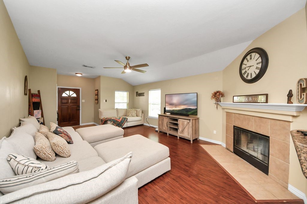 137 Rustic Colony Lane Dickinson, TX 77539 - Photo 3 of 13 Cozy fireplace