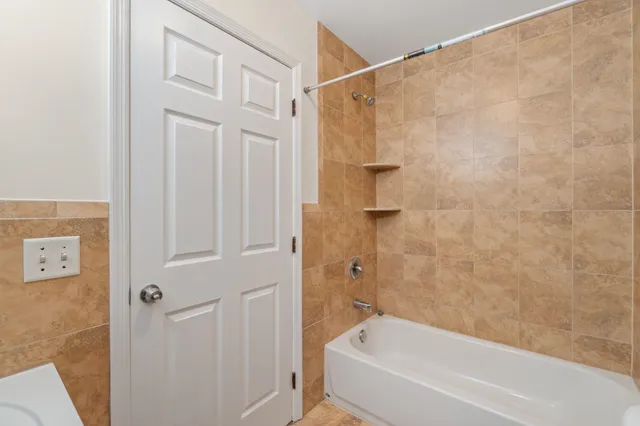 a bathroom with a bathtub