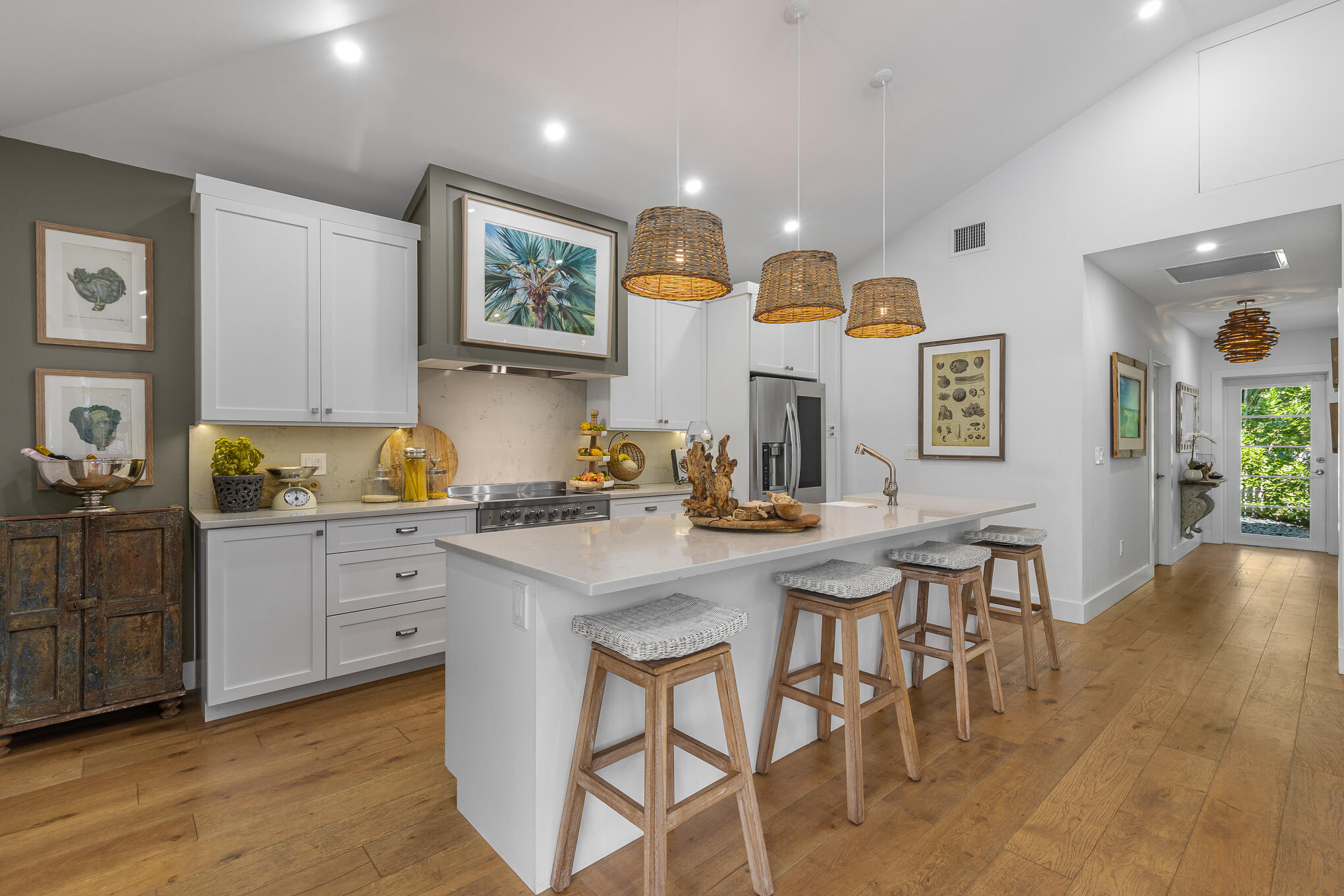 916 Seminary Street Key West, FL 33040 - Photo 15 of 37 a kitchen with cabinets and wooden floor