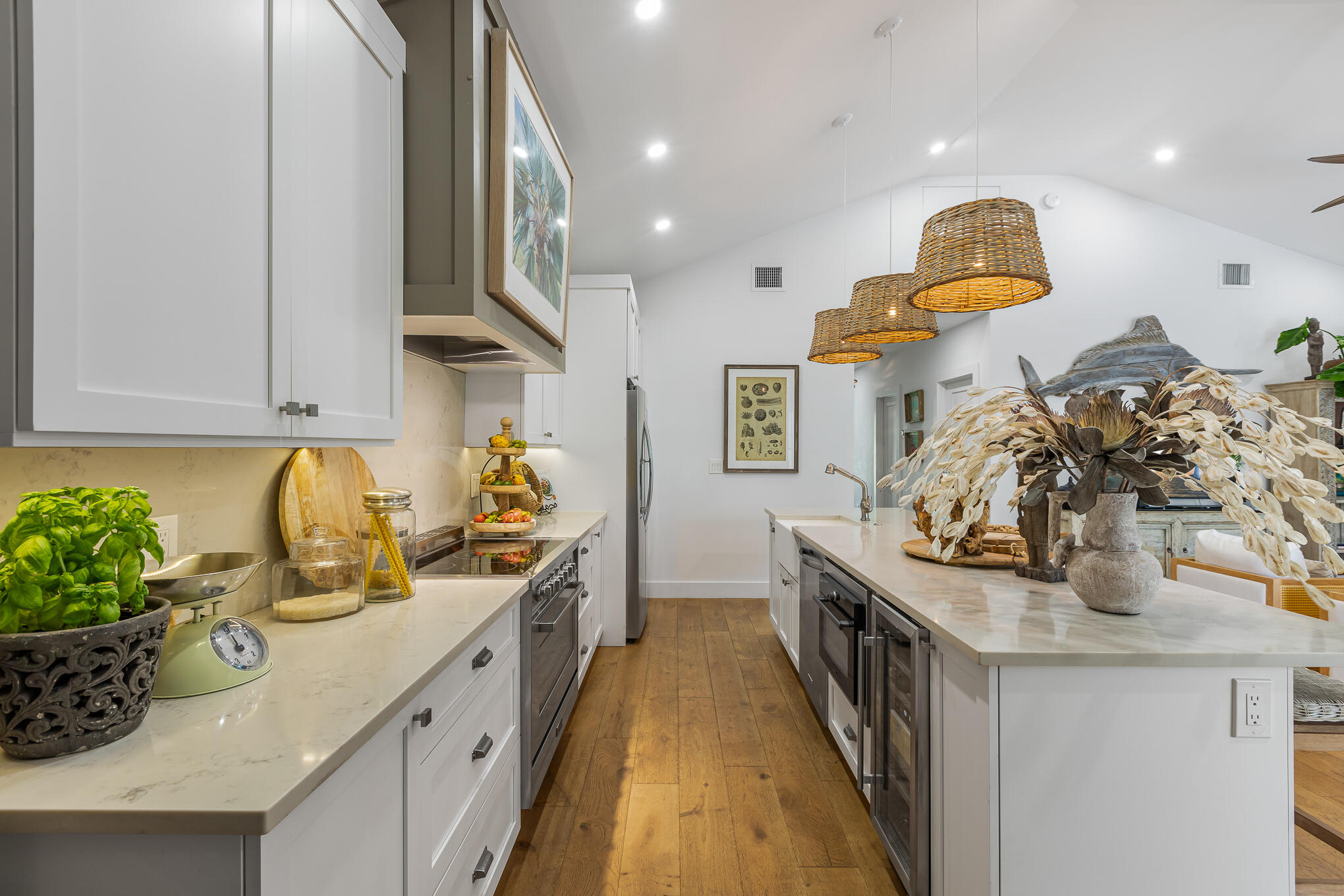 916 Seminary Street Key West, FL 33040 - Photo 17 of 37 a kitchen with stainless steel appliances granite countertop a stove and a wooden cabinets