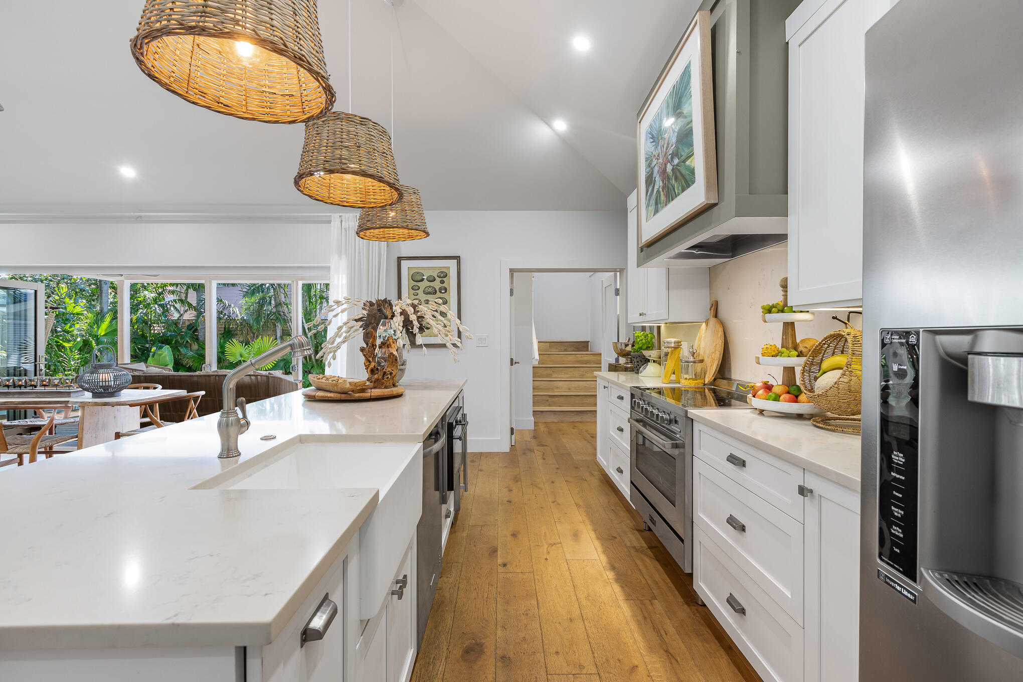 916 Seminary Street Key West, FL 33040 - Photo 18 of 37 a kitchen with counter top space cabinets and stainless steel appliances