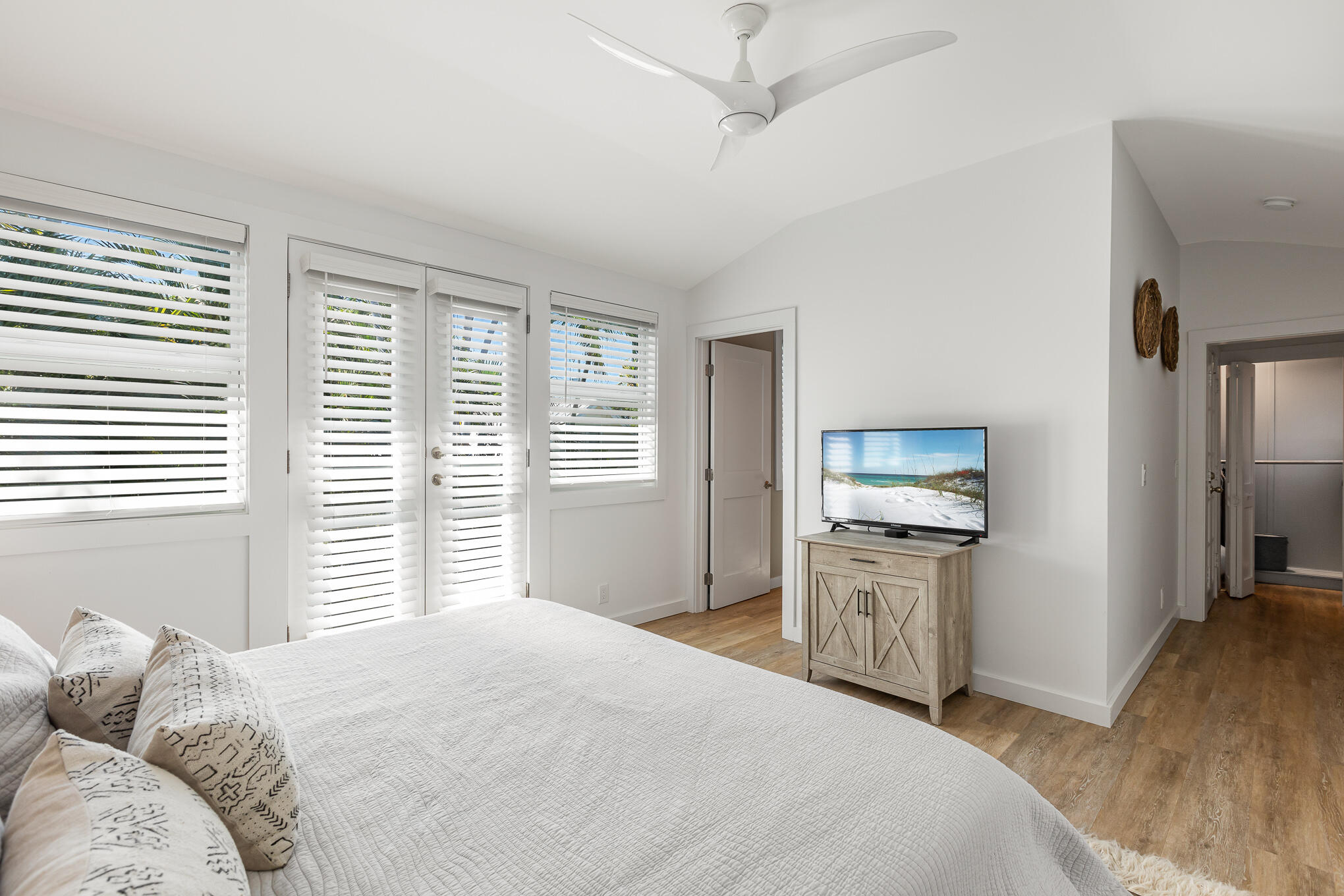 916 Seminary Street Key West, FL 33040 - Photo 25 of 37 a bedroom with a bed and a television