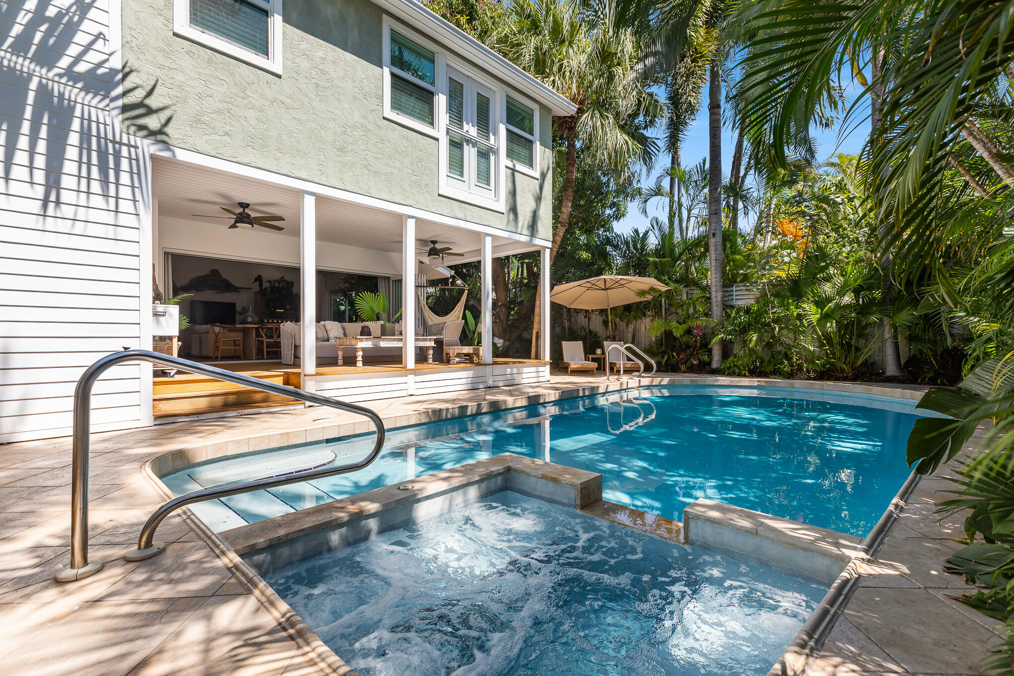 916 Seminary Street Key West, FL 33040 - Photo 30 of 37 a view of a house with backyard porch and sitting area