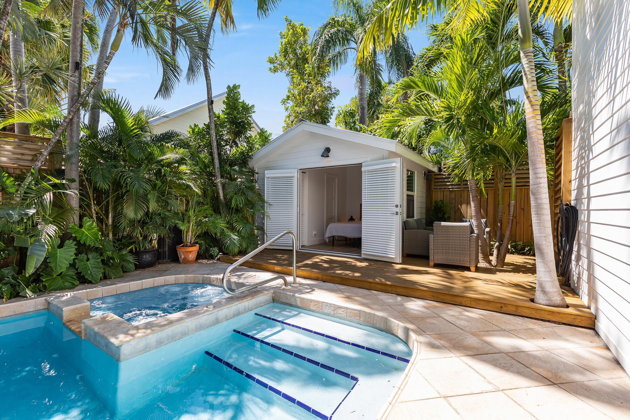916 Seminary Street Key West, FL 33040 - Photo 33 of 37 a view of a house with backyard and sitting area