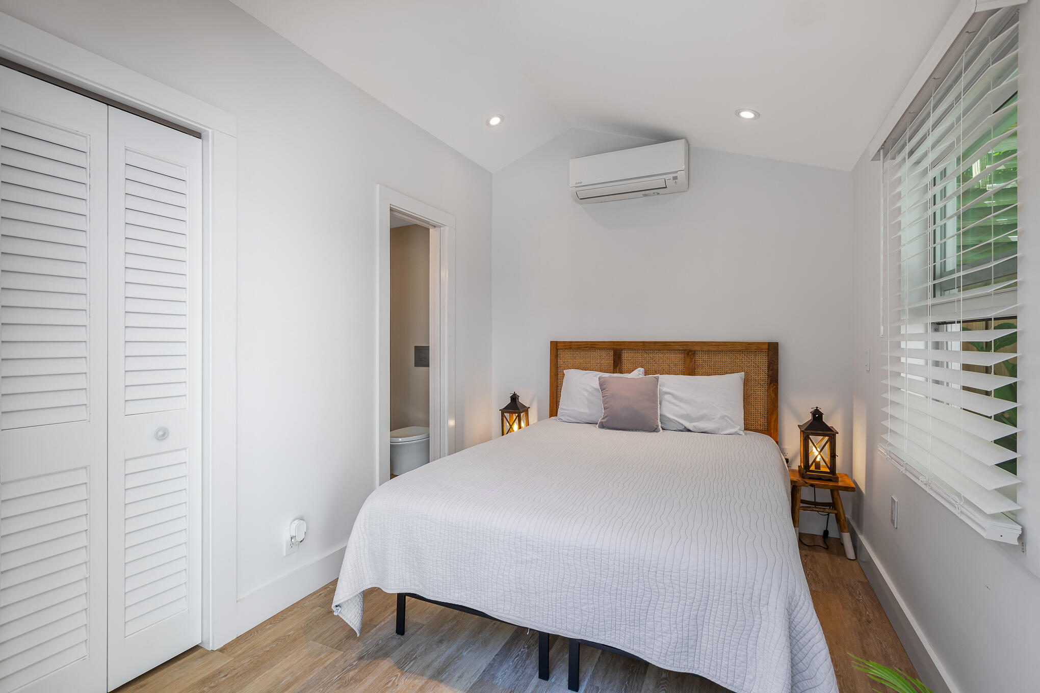 916 Seminary Street Key West, FL 33040 - Photo 34 of 37 a bedroom with a bed and a window