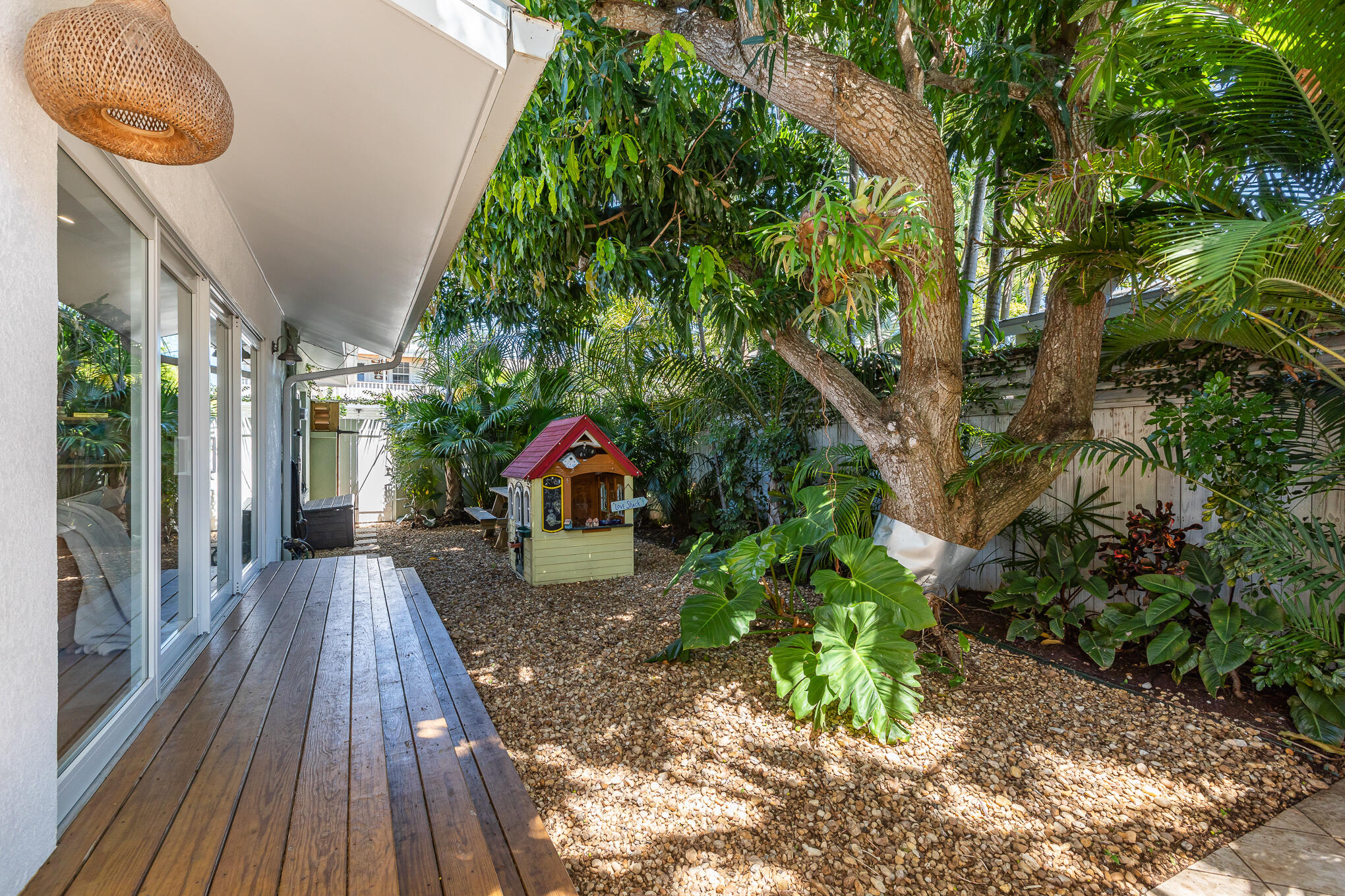 916 Seminary Street Key West, FL 33040 - Photo 36 of 37 a view of a porch with furniture and garden