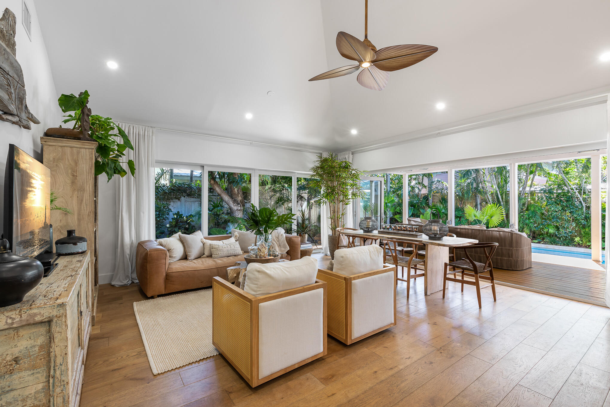 916 Seminary Street Key West, FL 33040 - Photo 9 of 37 a living room with furniture and a large window
