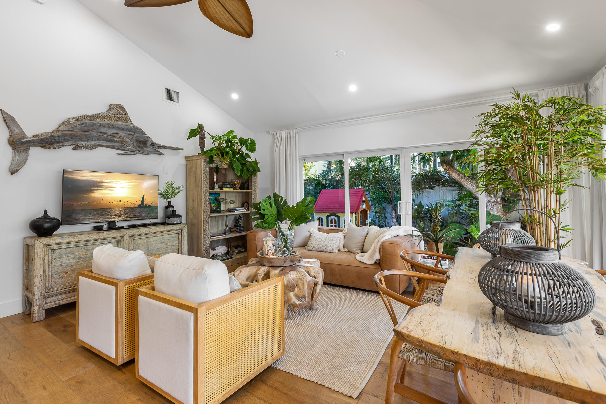 916 Seminary Street Key West, FL 33040 - Photo 10 of 37 a living room with furniture and a flat screen tv