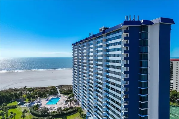 a view of balcony with wooden floor