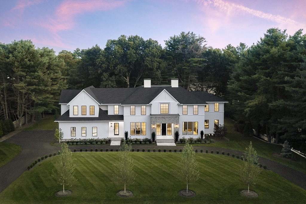 173 Stratford Road Needham, MA 02492 - Photo 2 of 6 a view of a big house with a big yard and large trees