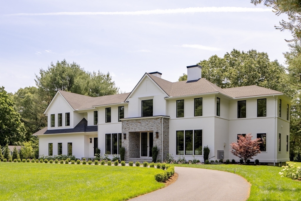 173 Stratford Road Needham, MA 02492 - Photo 3 of 6 a front view of a house with a yard