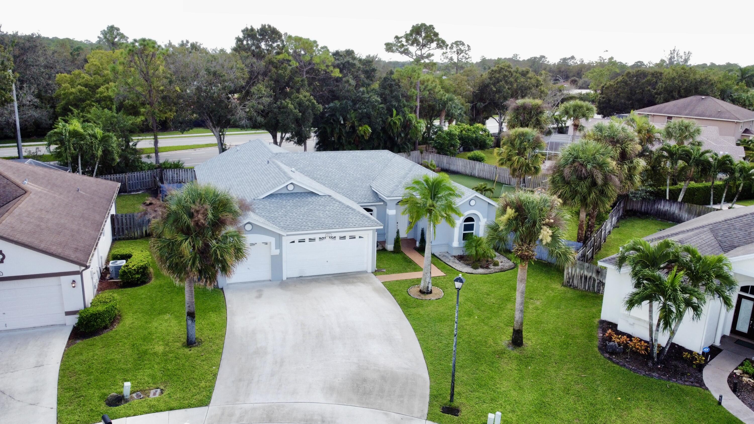 122 Nottingham Road Royal Palm Beach, FL 33411 - Photo 3 of 49 dji_fly_20241023_122118_473_172970088227