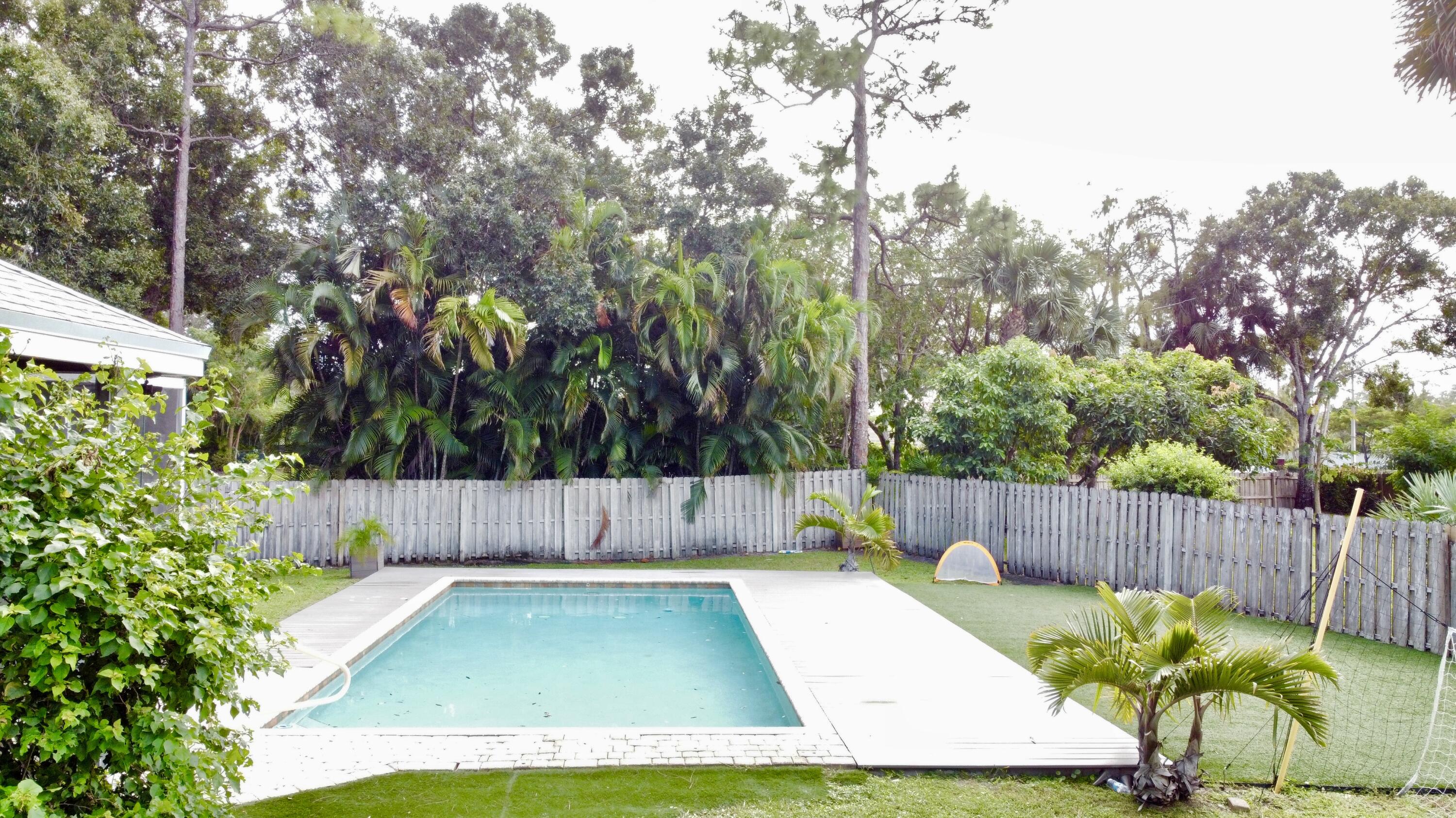 122 Nottingham Road Royal Palm Beach, FL 33411 - Photo 40 of 49 dji_fly_20241017_103754_419_172917605535