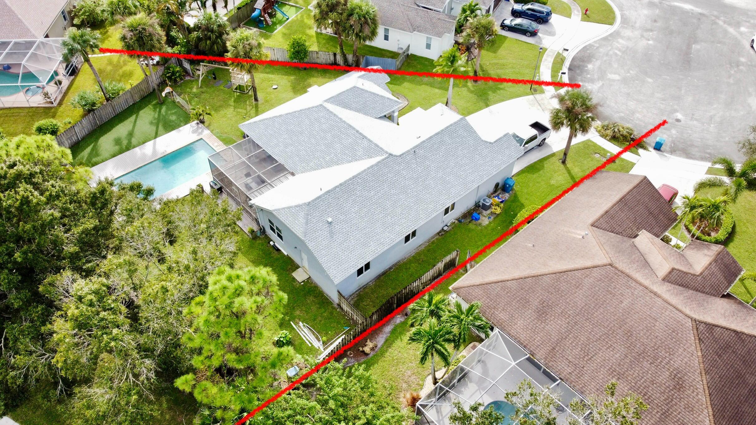 122 Nottingham Road Royal Palm Beach, FL 33411 - Photo 7 of 49 dji_fly_20241017_161056_443_172970099368