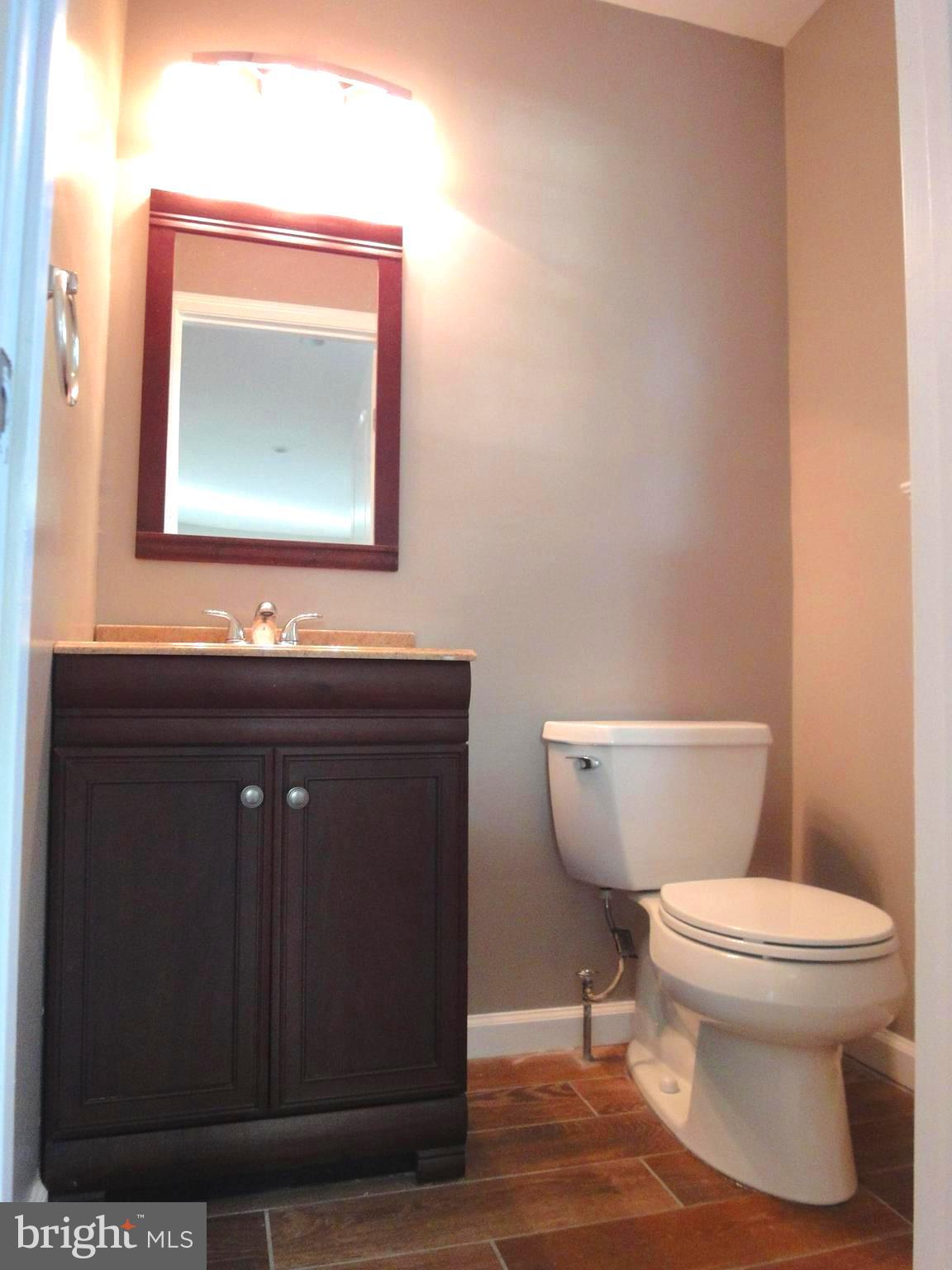 1307 Brixton Road Baltimore, MD 21239 - Photo 11 of 25 Half bath on the main level