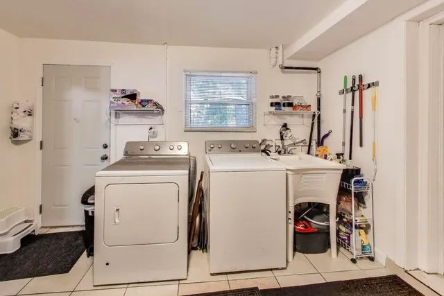 a utility room with dryer and washer