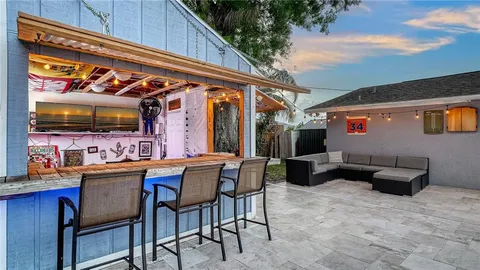 a outdoor dining space with furniture
