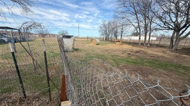 a view of deck with wooden floor and outdoor seating
