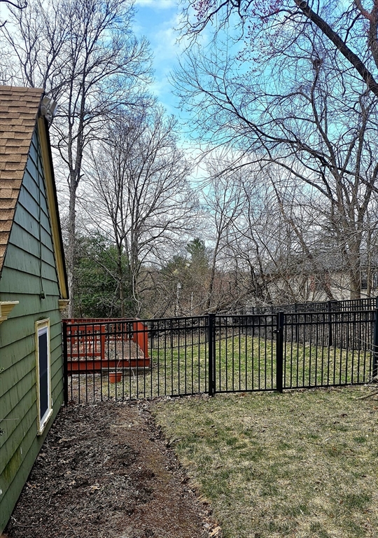 9 Howe Avenue Shrewsbury, MA 01545 - Photo 3 of 9 a view of a backyard with a large tree