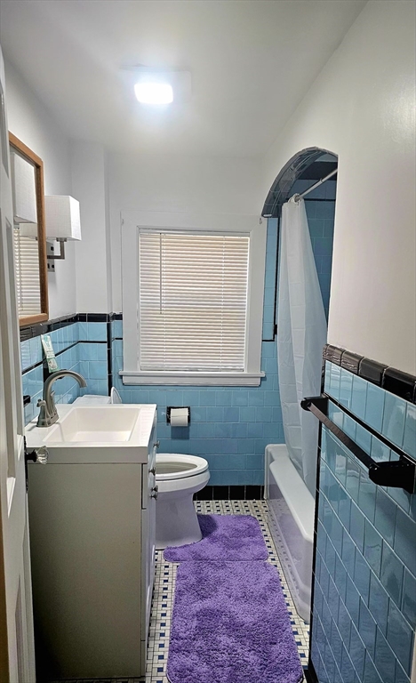 9 Howe Avenue Shrewsbury, MA 01545 - Photo 7 of 9 a bathroom with a sink toilet and mirror