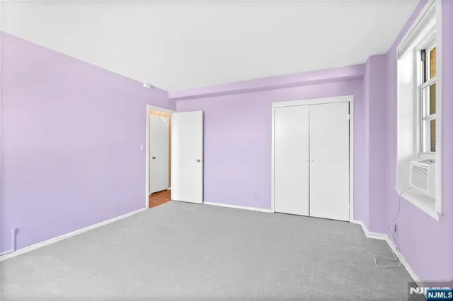 a bathroom with a sink a mirror a toilet and shower