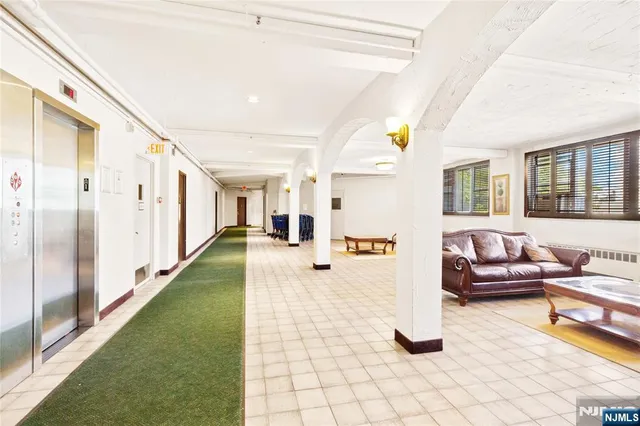 a view of swimming pool with a yard