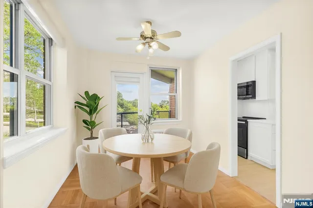 a view of a big room with closet and windows