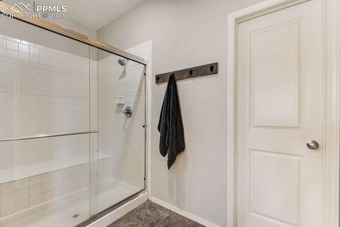 13873 Windy Oaks Road Colorado Springs, CO 80921 - Photo 19 of 28 a bathroom with a shower