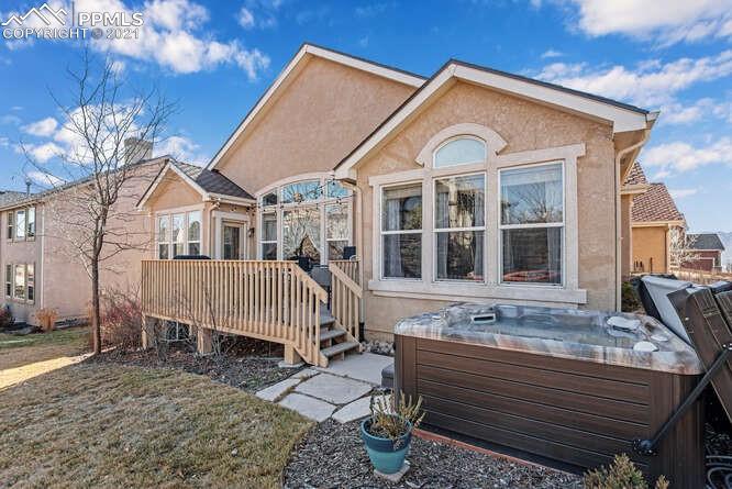 13873 Windy Oaks Road Colorado Springs, CO 80921 - Photo 3 of 28 a front view of a house with a yard