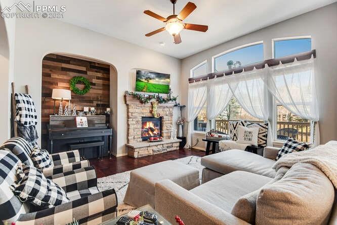 13873 Windy Oaks Road Colorado Springs, CO 80921 - Photo 10 of 28 a living room with furniture and a large window