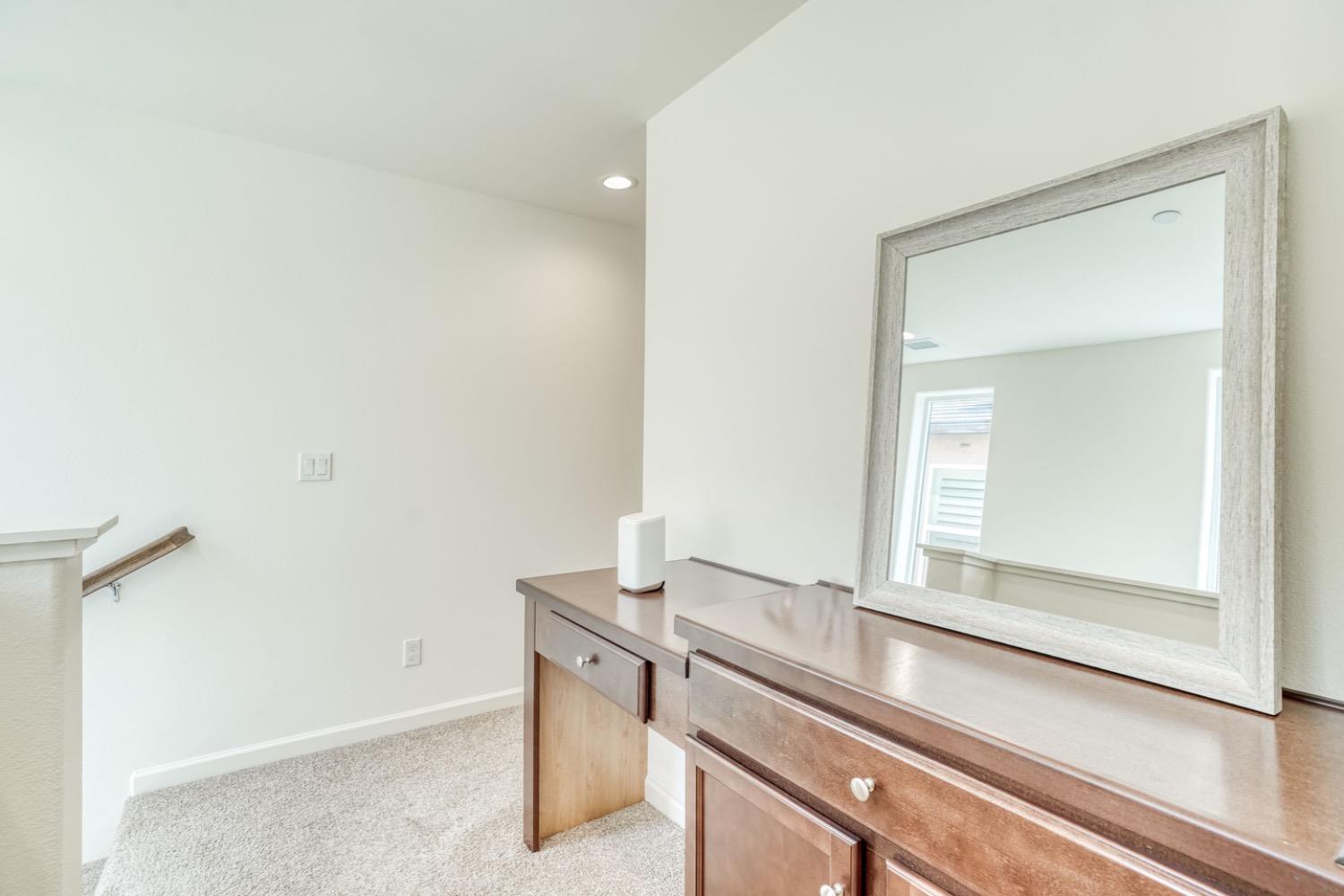 933 Winchell Way West Madera, CA 93636 - Photo 15 of 29 a bathroom with a sink and a mirror
