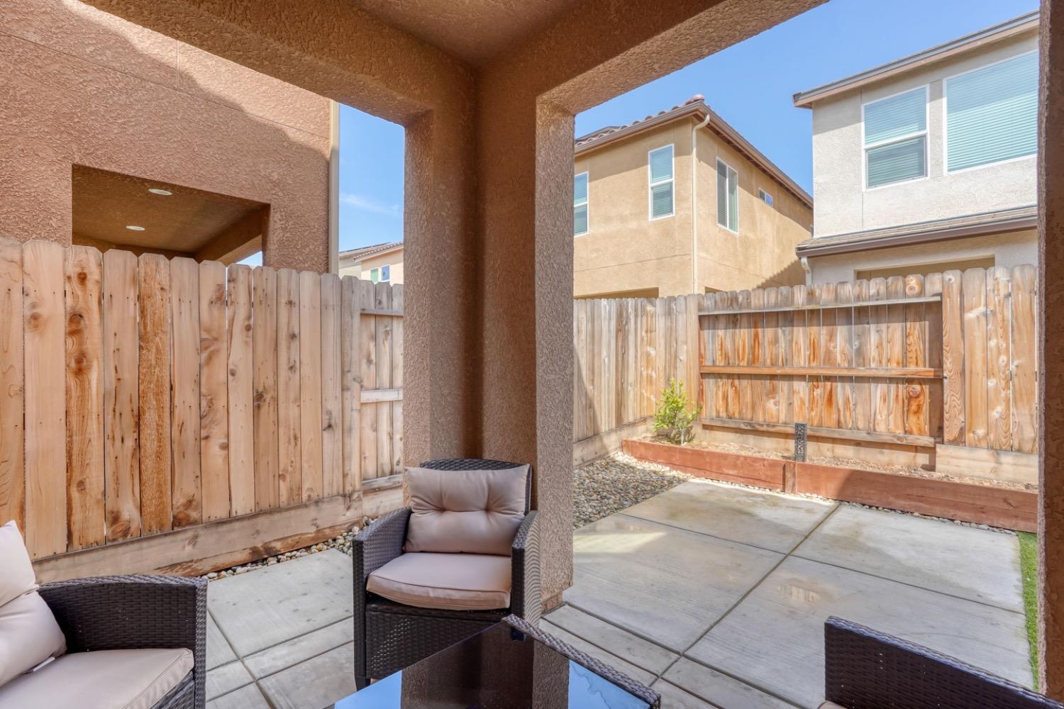 933 Winchell Way West Madera, CA 93636 - Photo 17 of 29 a living room with furniture and a large window