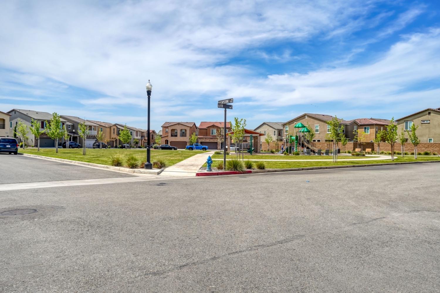 933 Winchell Way West Madera, CA 93636 - Photo 21 of 29 a view of a city with tall buildings