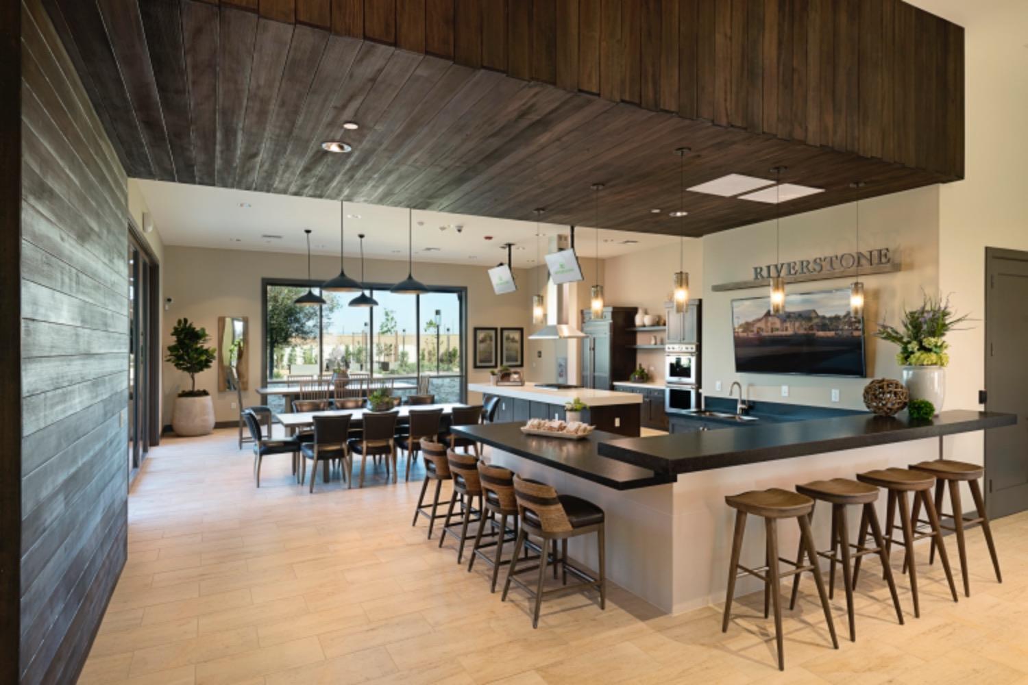 933 Winchell Way West Madera, CA 93636 - Photo 24 of 29 a kitchen with lots of counter top space and dining table