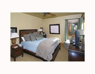 410 Cresta Road Edwards, CO 81632 - Photo 11 of 11 a bedroom with a bed and cupboard