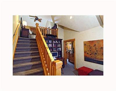 410 Cresta Road Edwards, CO 81632 - Photo 9 of 11 a picture of a living room with stairs